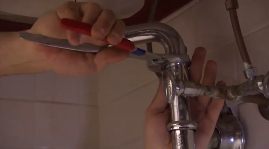 Servicing a chrome basin faucet with a hand tool